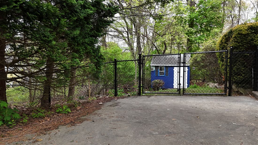 Black chain link fence with gate