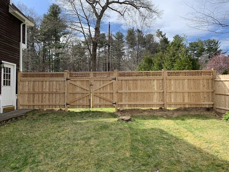 Wood fence with lattice top and custom gate